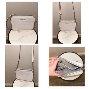 White Michael Kors cross body bag.